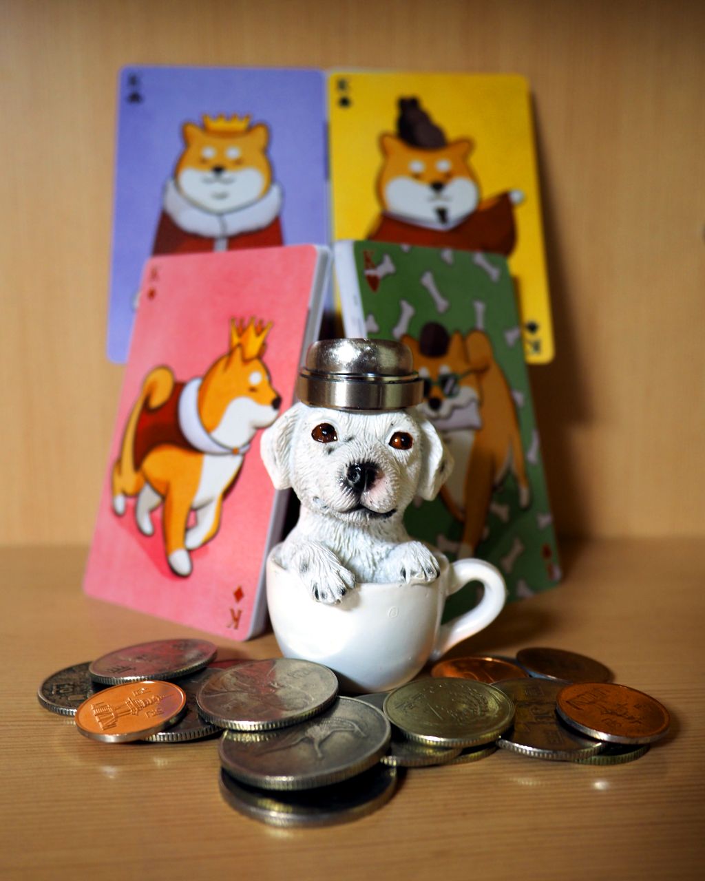 pub in cup in front of doge cards, all are kings